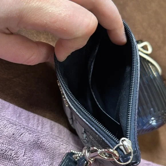Vintage COACH perfect pre-loved condition wristlet. Two-tone blue with silver.